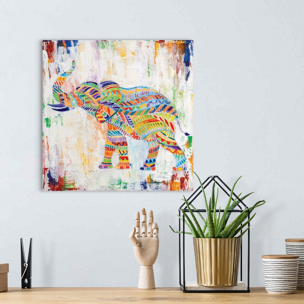 A bohemian room featuring A painting of an elephant made up of unique multi-colored designs.