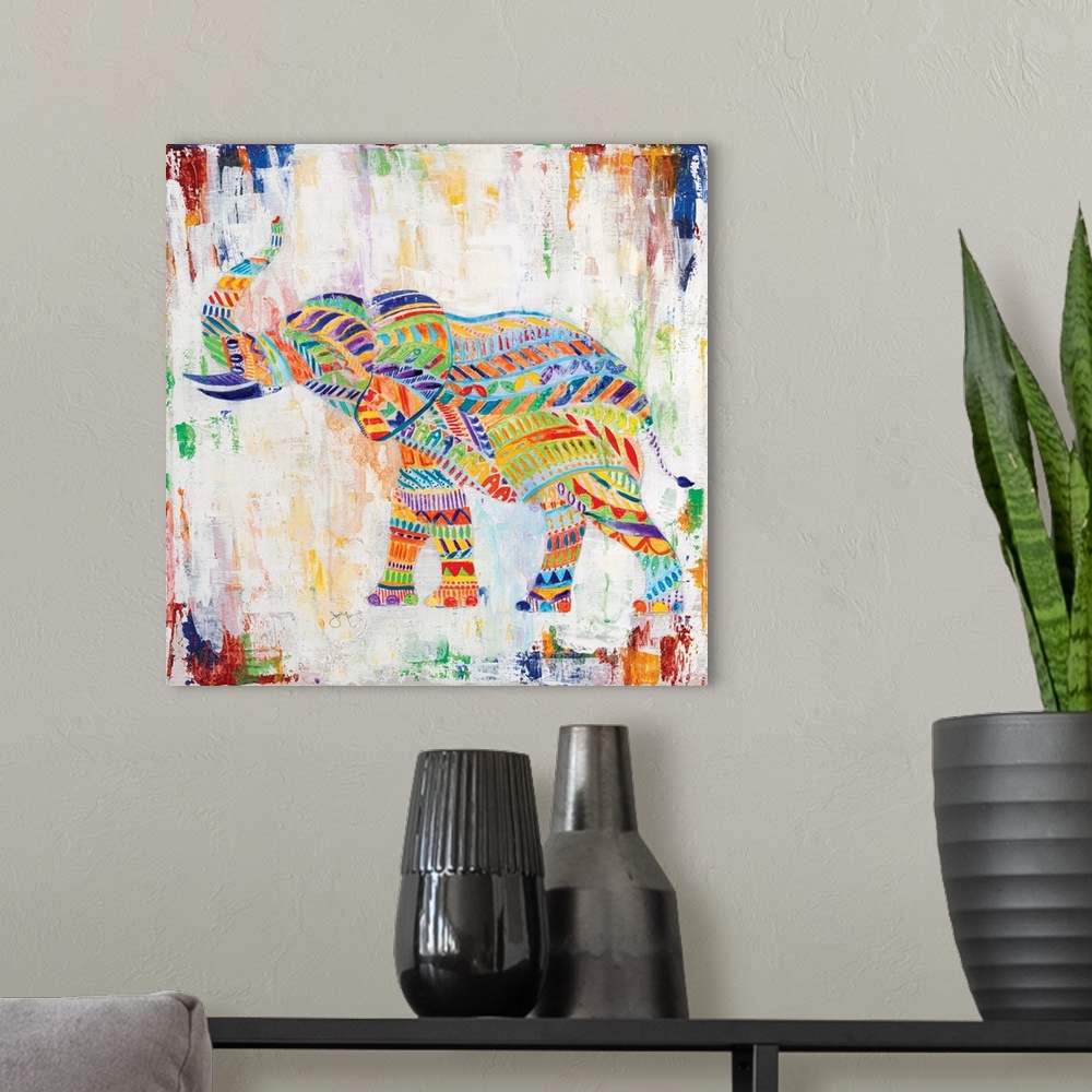 A modern room featuring A painting of an elephant made up of unique multi-colored designs.