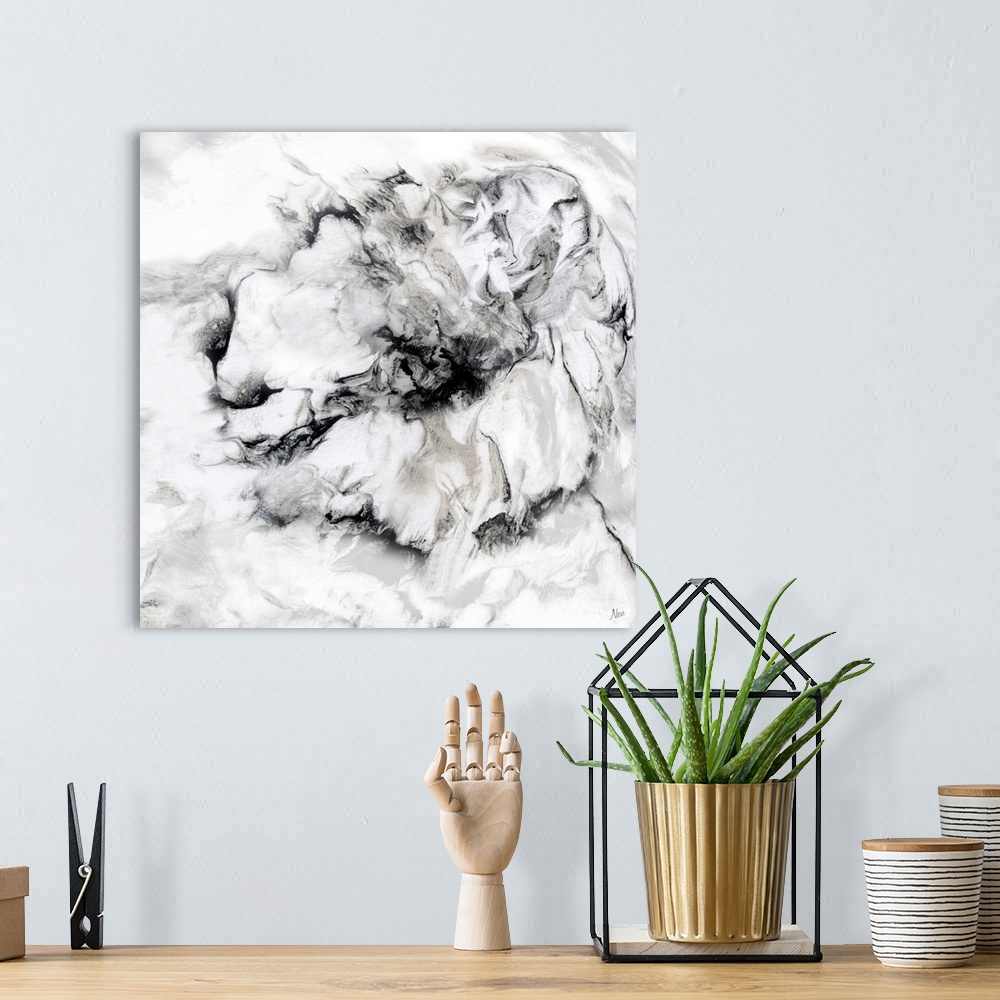 A bohemian room featuring Black and white art print of a flower with a wavy, marbled effect.