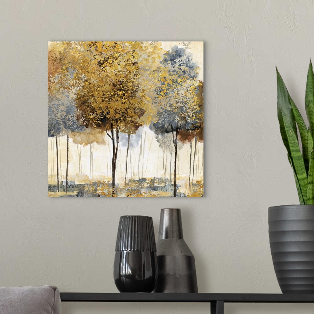 A modern room featuring Square decor with metallic gold and silver trees in an abstract forest.