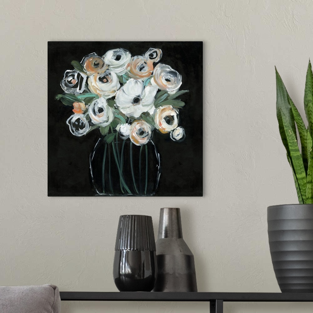 A modern room featuring Square painting with white and orange flowers in a glass vase on a solid black background creatin...