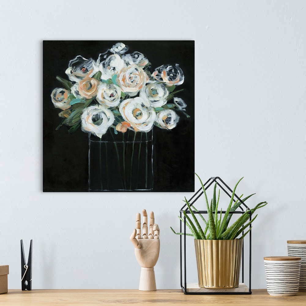 A bohemian room featuring Square painting with white and orange flowers in a glass vase on a solid black background creatin...