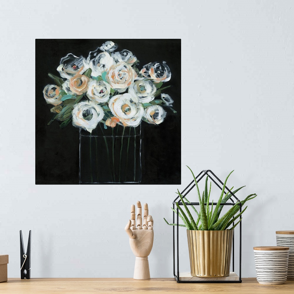 A bohemian room featuring Square painting with white and orange flowers in a glass vase on a solid black background creatin...
