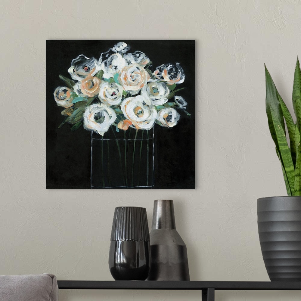A modern room featuring Square painting with white and orange flowers in a glass vase on a solid black background creatin...