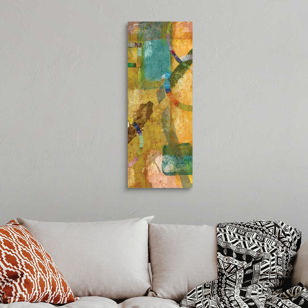 A bohemian room featuring Contemporary abstract art print in cheerful shades of yellow, pink, and blue.