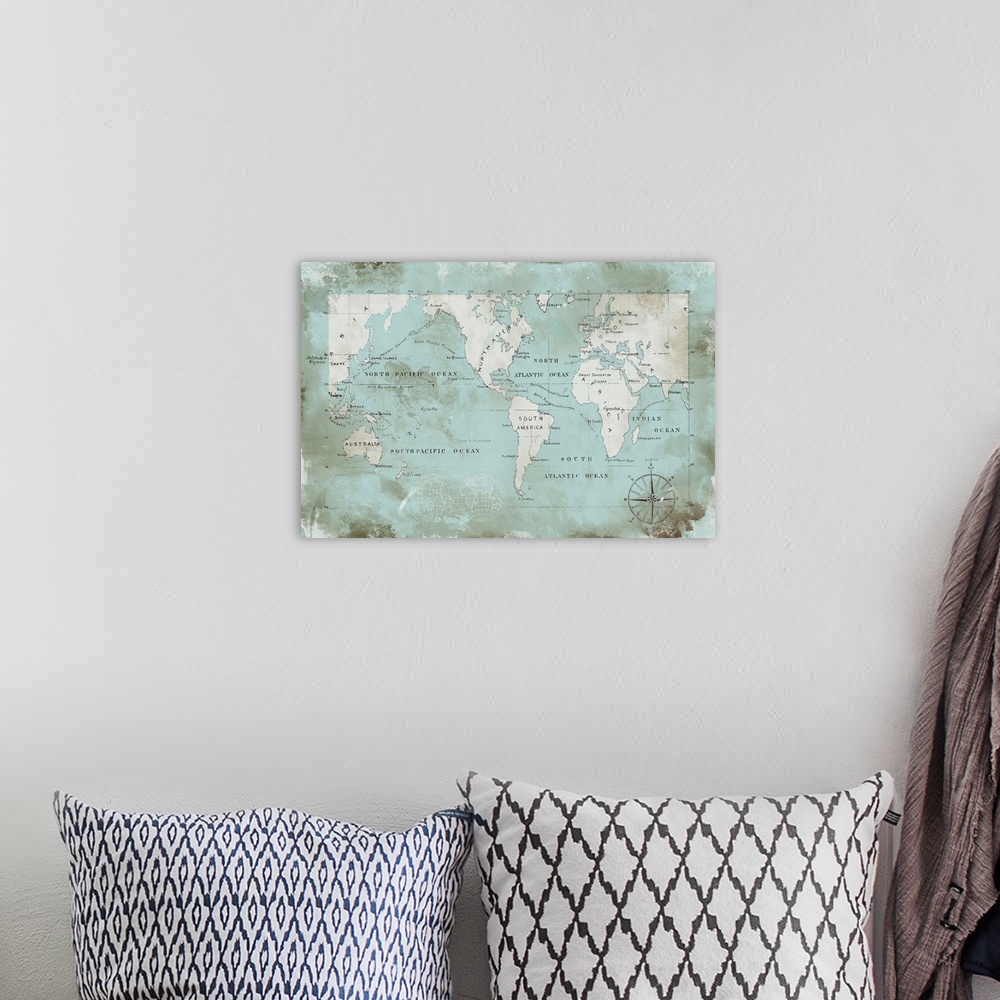A bohemian room featuring Antique map of the World.