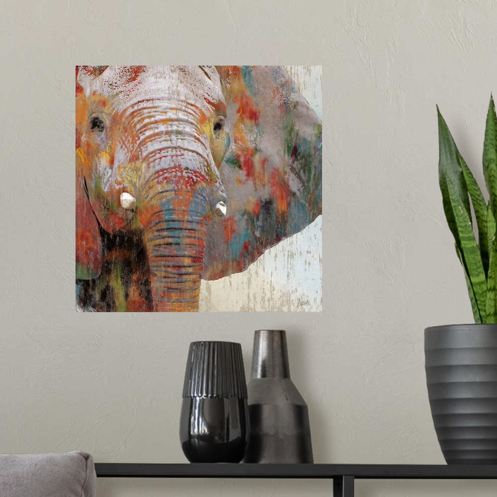 A modern room featuring A close up of an elephant with paint splattered all over it.