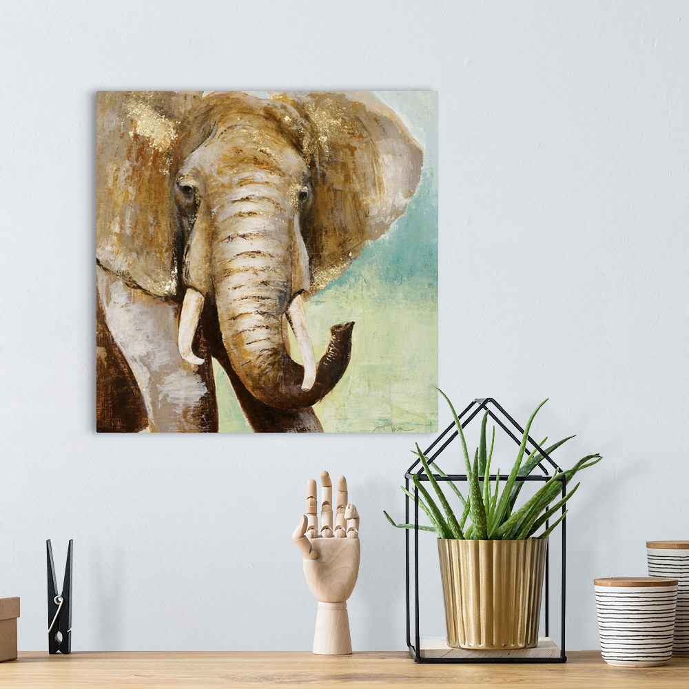 A bohemian room featuring Square painting of an elephant in brown tones with metallic gold highlights, on a blue and green ...