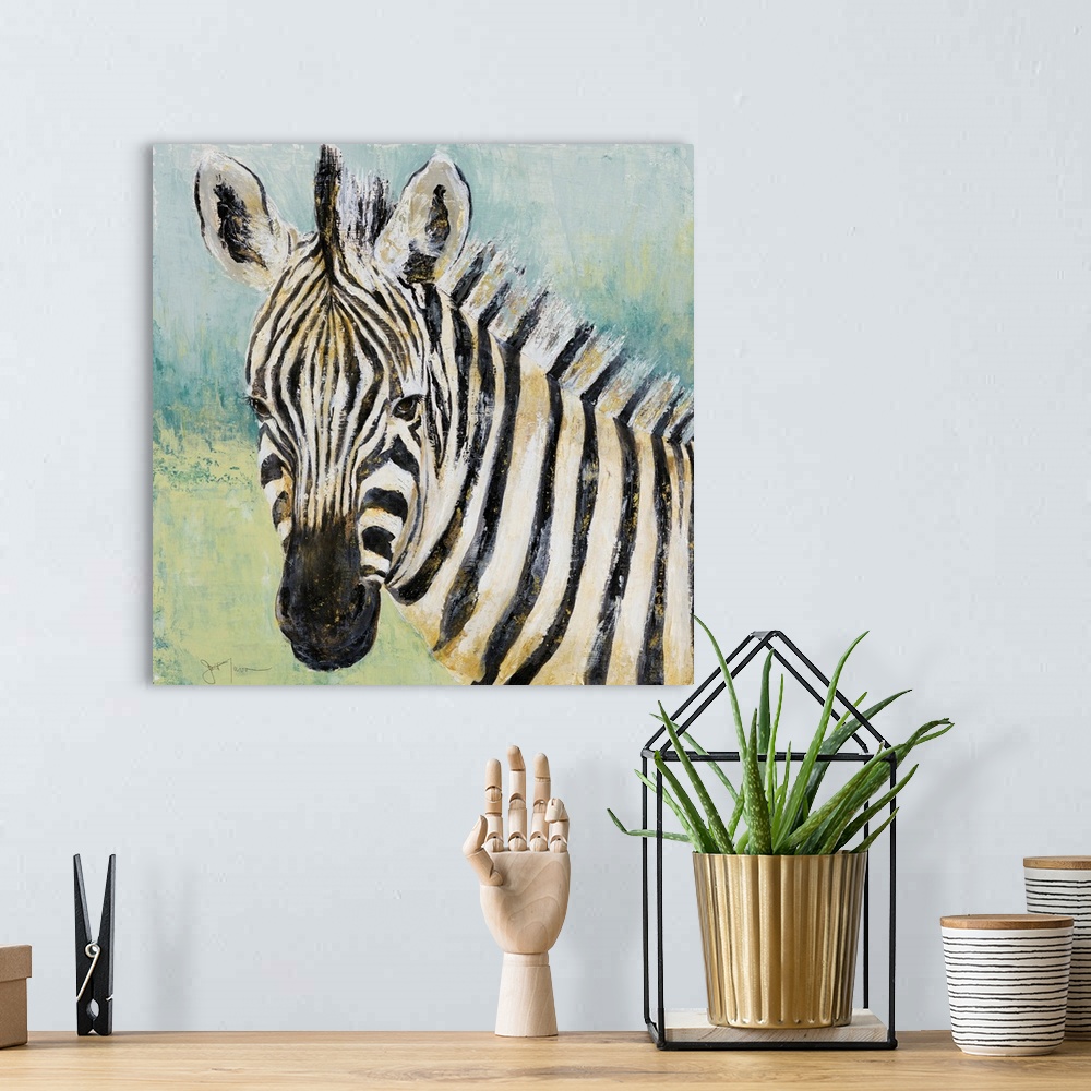 A bohemian room featuring Square painting of a zebra with black and white stripes and gold shading and highlighting, on a b...