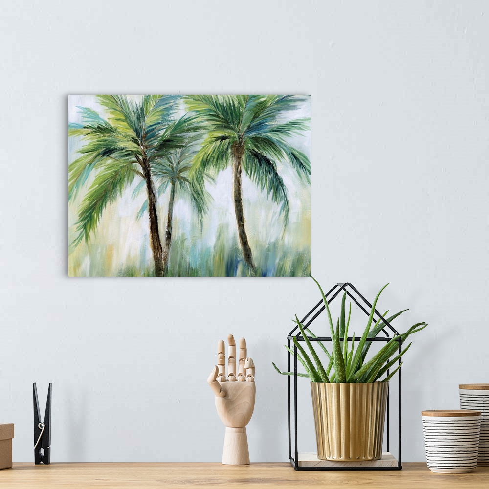 A bohemian room featuring Large palm tree landscape painting in shades of blue, green, yellow, and white.