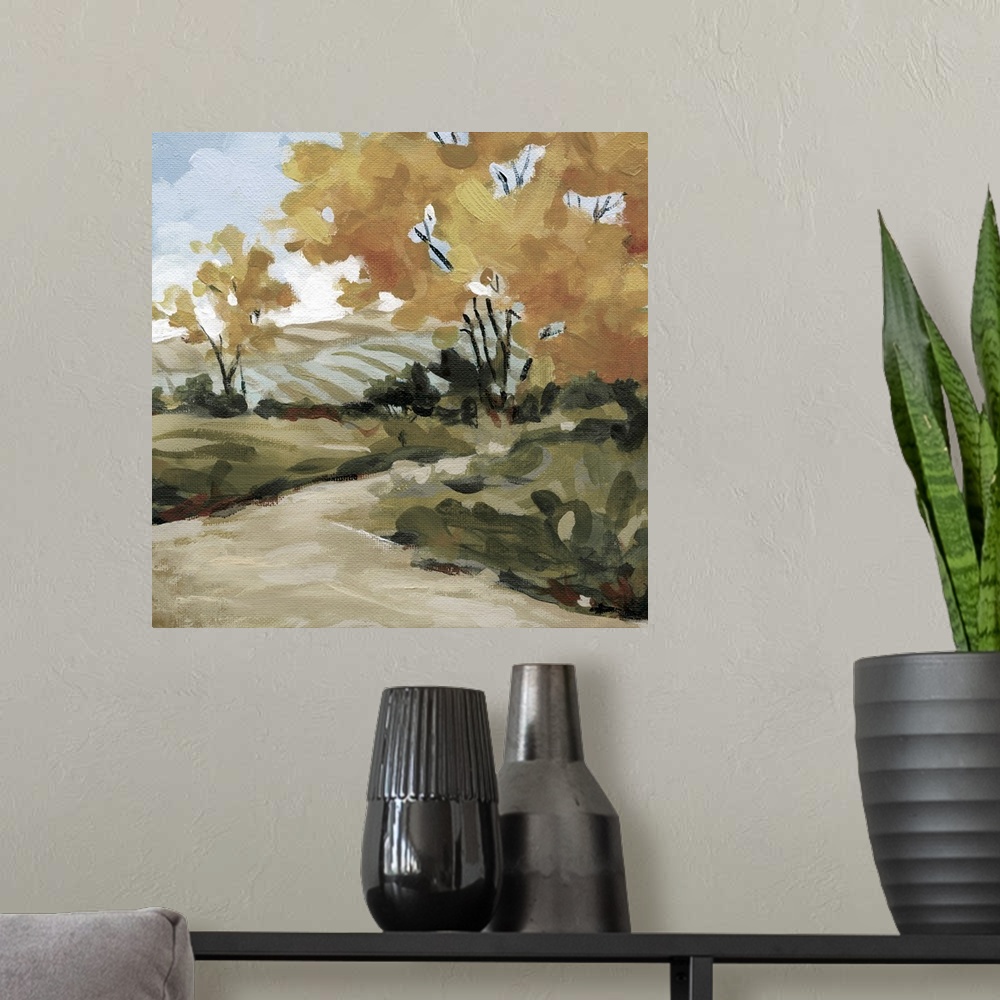 A modern room featuring A painting of a pasture surrounded by trees with a pathway created from broad brushstrokes.
