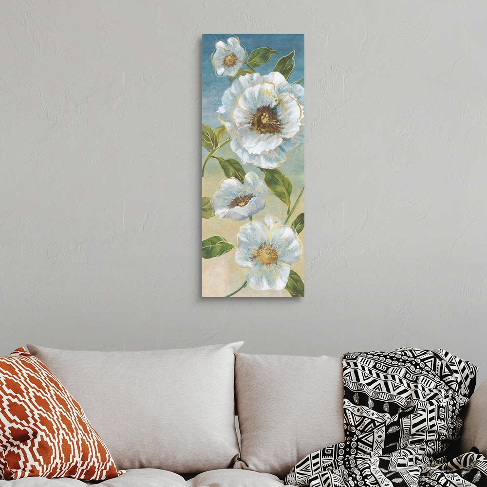 A bohemian room featuring Tall panel painting of white poppies with metallic gold highlights on a blue and tan background.