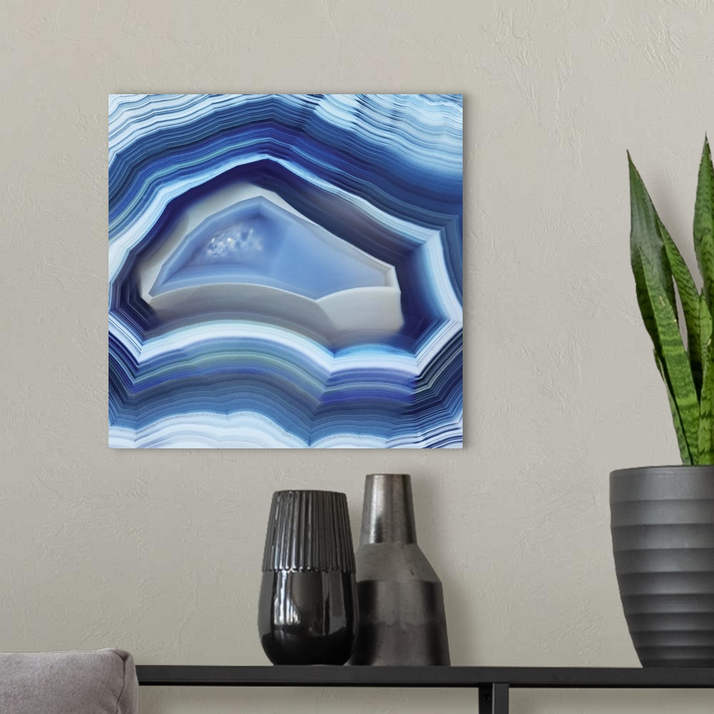 A modern room featuring Square agate art in shades of blue.