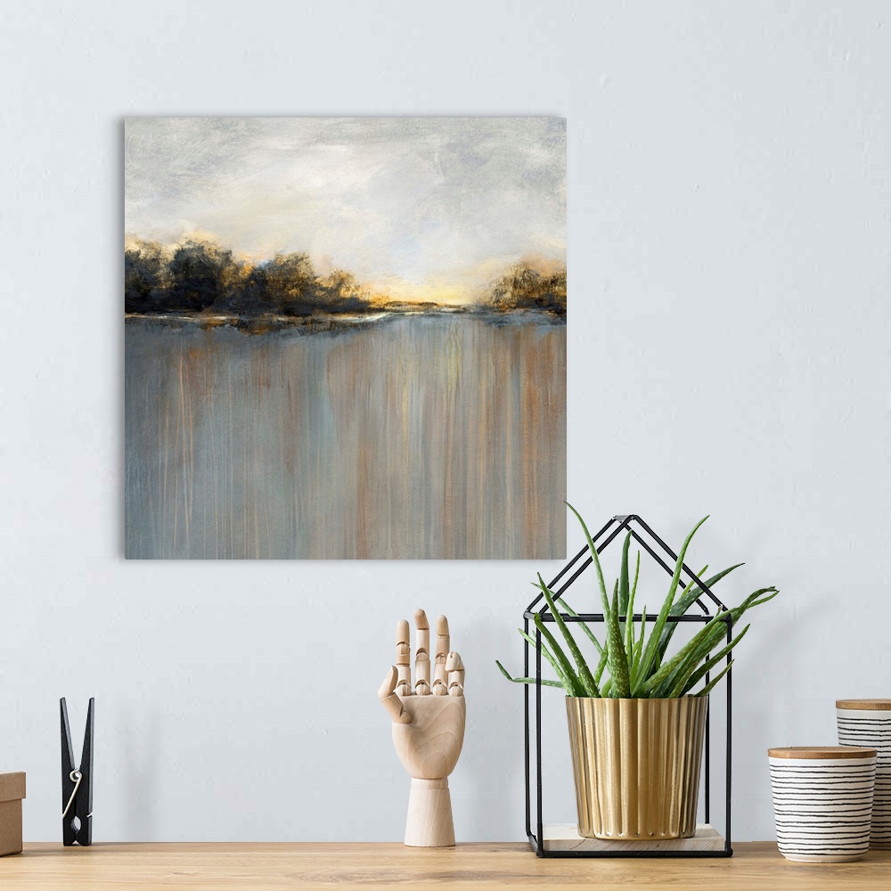 A bohemian room featuring Square abstract landscape of a rainy sunset over a lake lined with trees.