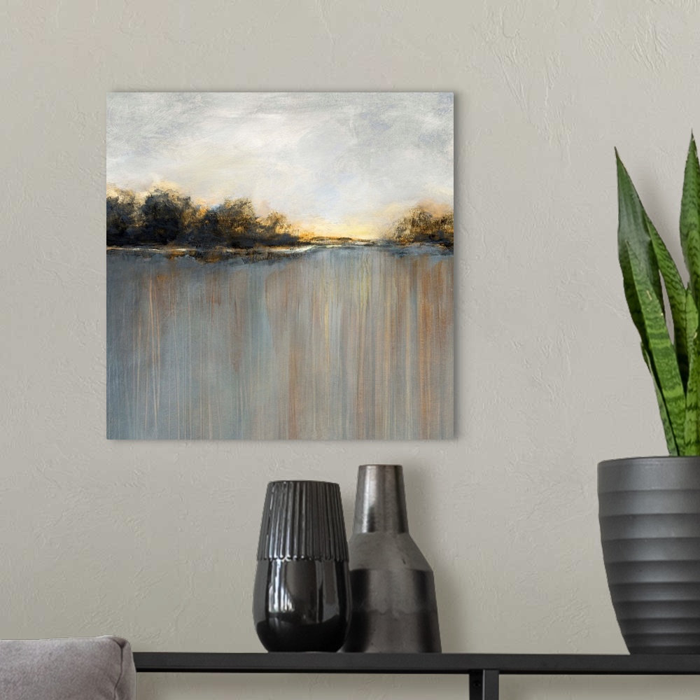 A modern room featuring Square abstract landscape of a rainy sunset over a lake lined with trees.