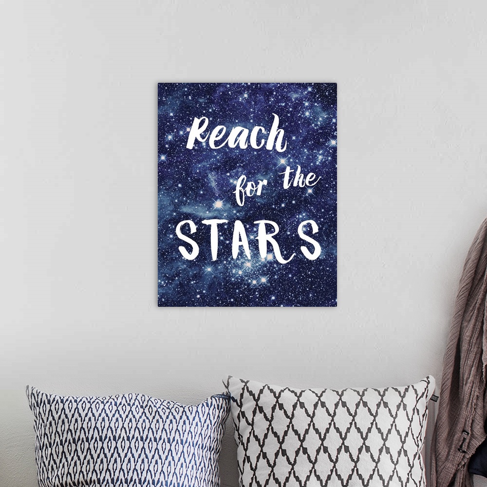A bohemian room featuring Vertical decorative design of stars with the text "Reach For The Stars" in white.