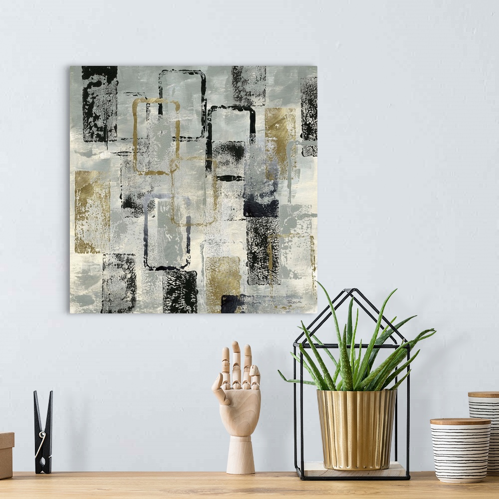 A bohemian room featuring Square abstract painting with gold and black rectangles on a silver and cream background with a s...