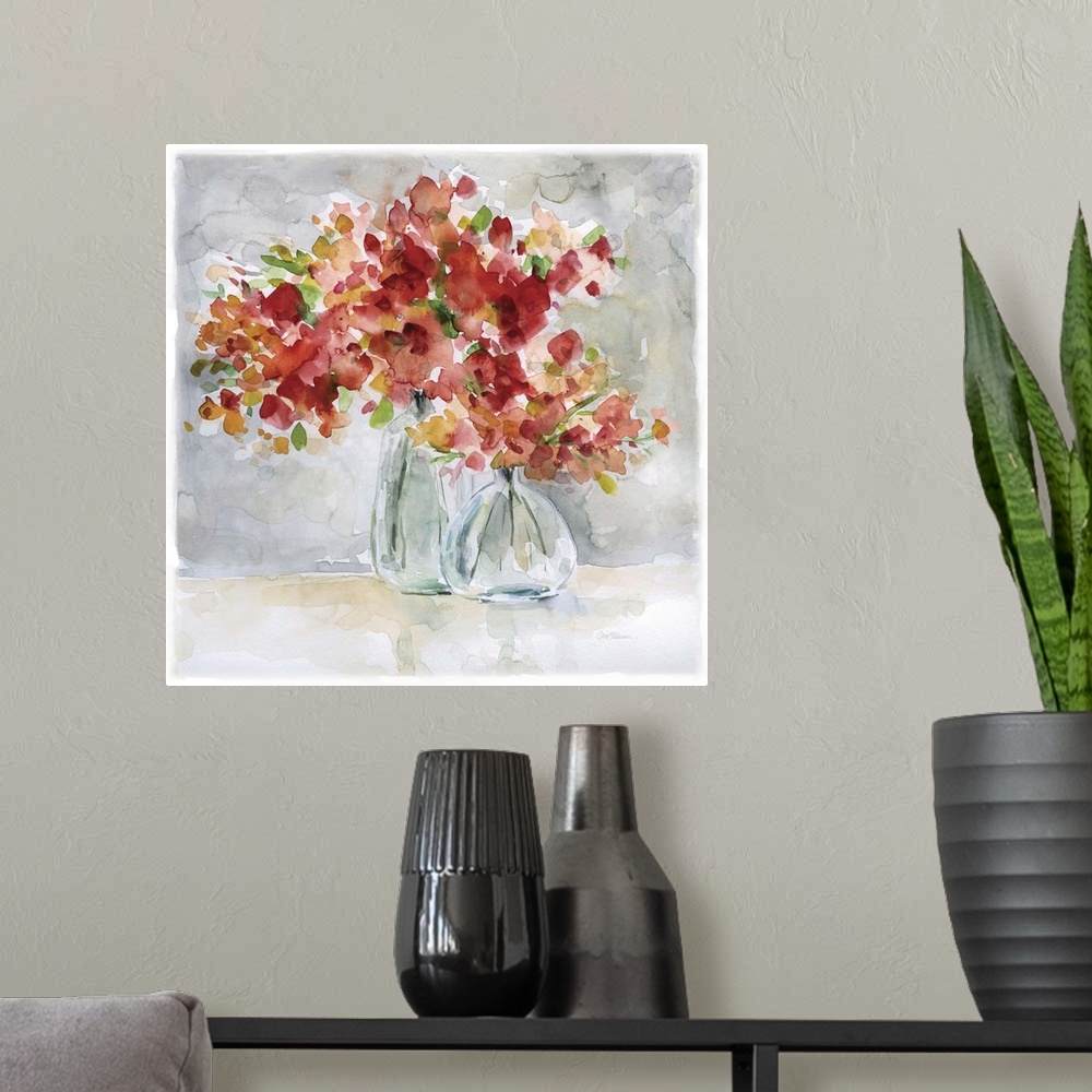 A modern room featuring Beautiful square watercolor painting of red and orange flowers in glass vases on a gray and tan b...