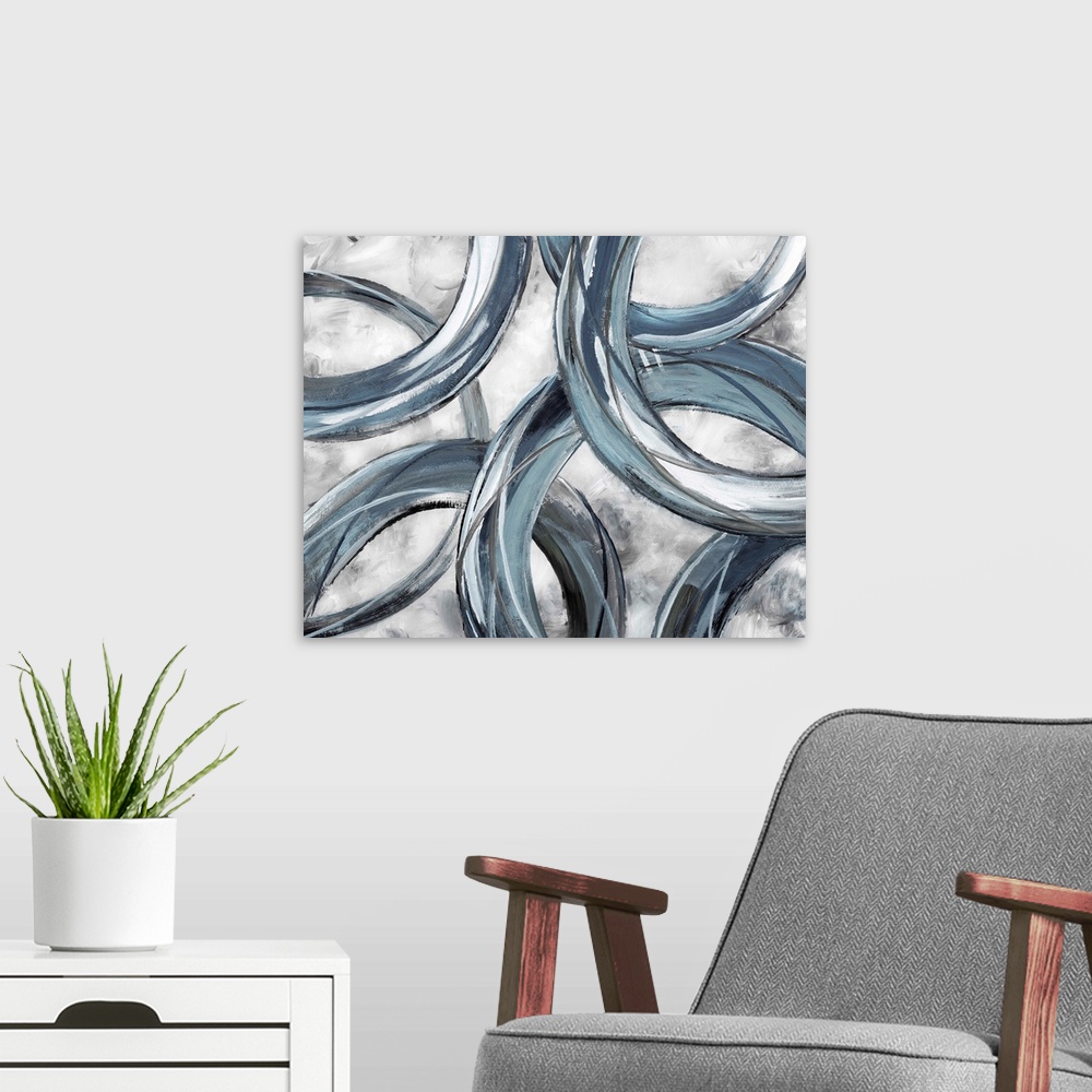 A modern room featuring Partially hidden rings of blue and gray brush strokes are displayed against a light background in...