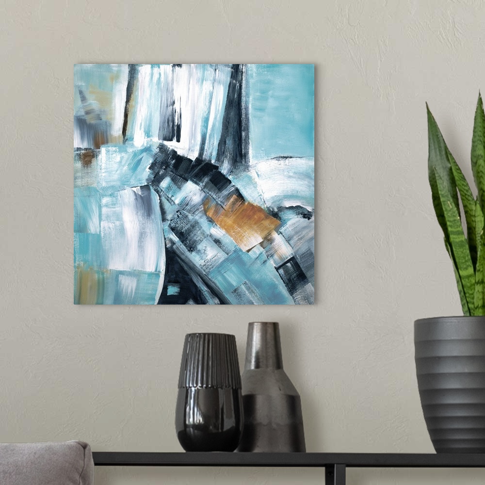 A modern room featuring Busy square abstract painting in shades of blue, tan, and grey.