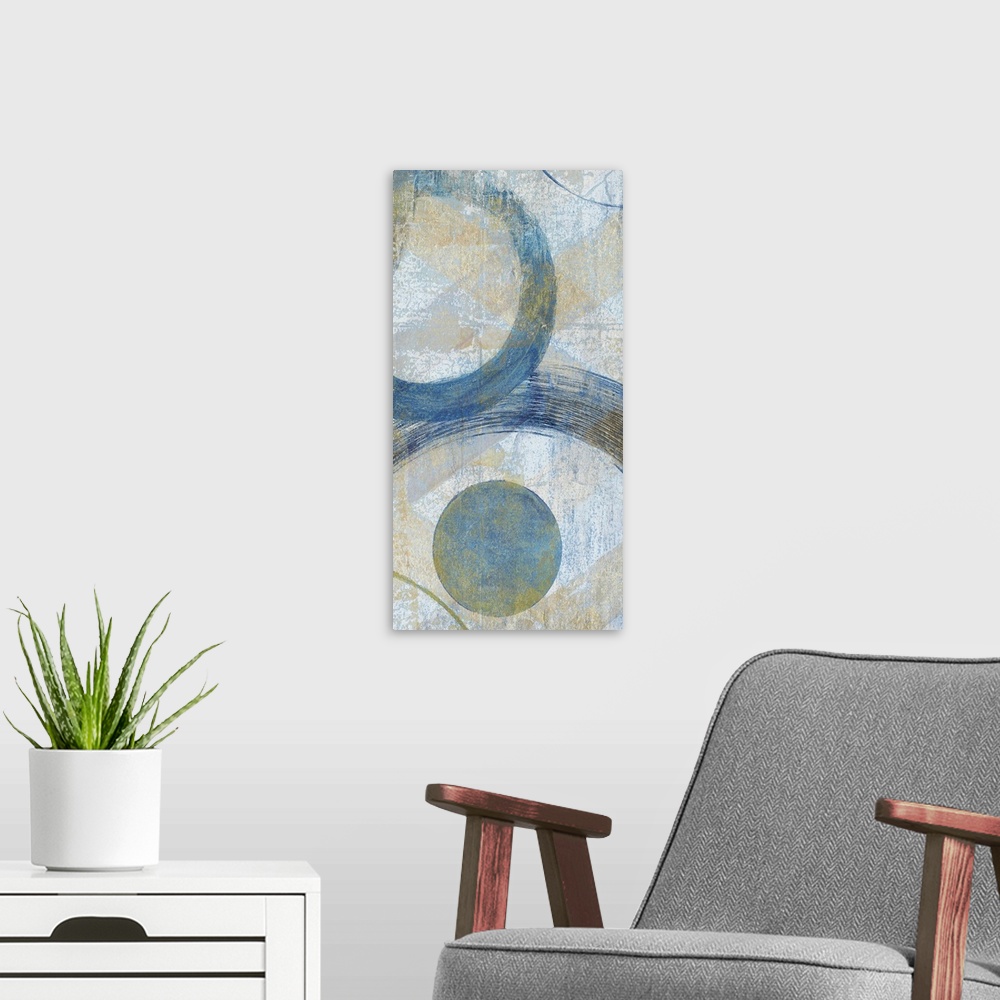 A modern room featuring Abstract painting that has big blue circular outlines with hints of gold on a textured background.