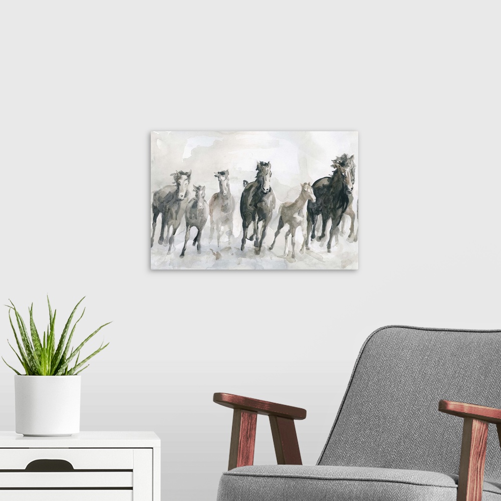 A modern room featuring Watercolor painting of a pack of galloping horses in neutral tones with a hint of blue.
