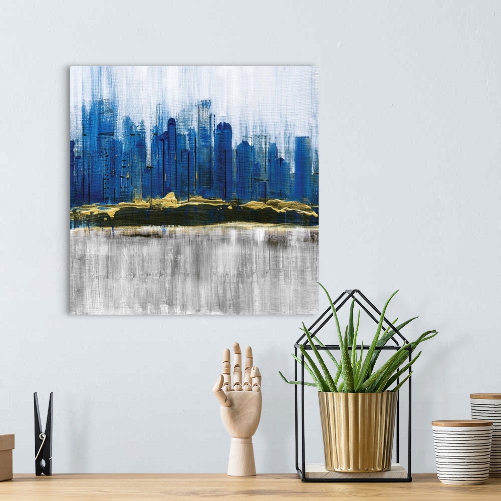 A bohemian room featuring Square abstract painting of a city skyline in shades of blue with gold on a gray and white backgr...