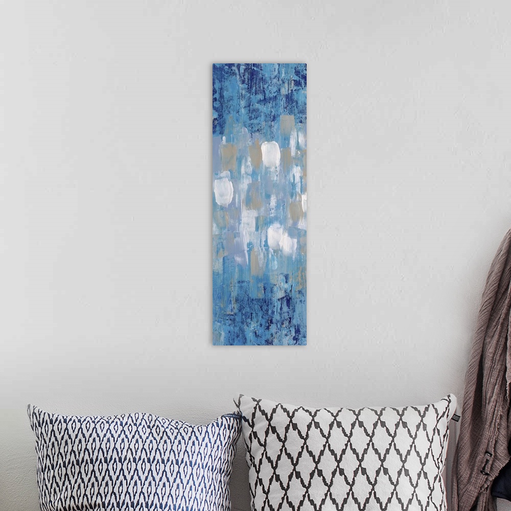 A bohemian room featuring Contemporary abstract painting in blue with white and grey shapes in the center.
