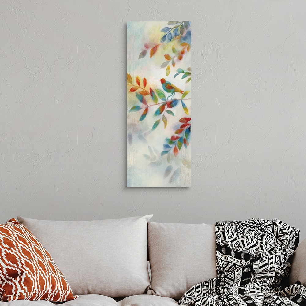 A bohemian room featuring Tall painting of colorful branches and leaves with a bird perched in the middle.
