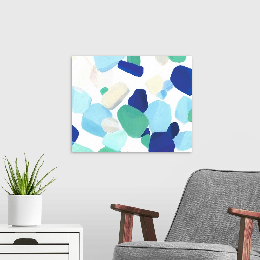 A modern room featuring Large abstract painting resembling seaglass in shades of blue, green, and tan.