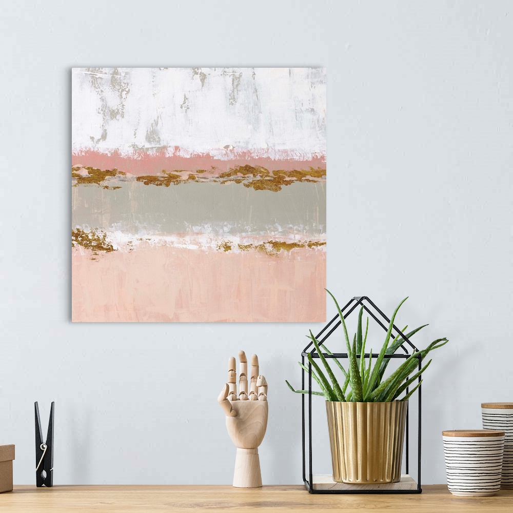 A bohemian room featuring Square abstract artwork made with horizontal sections in pale pink, gray, white, and metallic gol...