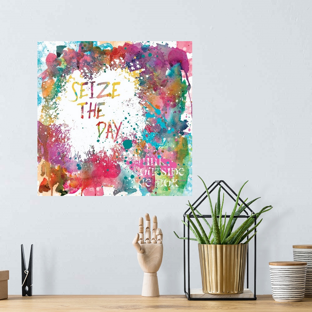 A bohemian room featuring Inspirational square painting with colorful paint splatter and the phrases "Seize The Day" and "T...