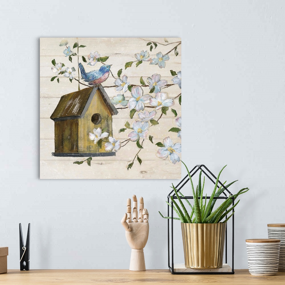 A bohemian room featuring A painting of a birdhouse hanging from a tree with a bird perched on top, surrounded with white f...