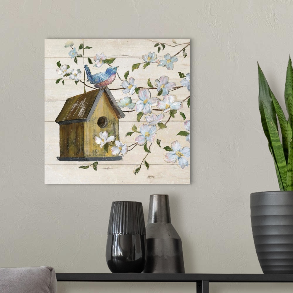 A modern room featuring A painting of a birdhouse hanging from a tree with a bird perched on top, surrounded with white f...