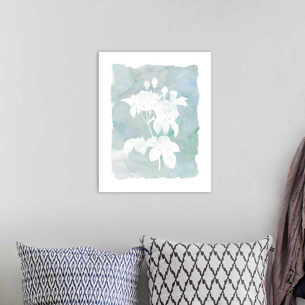 A bohemian room featuring A watercolor painting with white silhouettes of flowers and a blue-green background.
