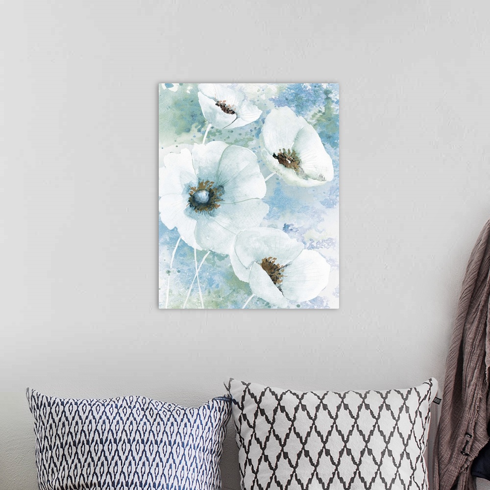 A bohemian room featuring Watercolor painting of white poppies on a blue and green paint splattered background.