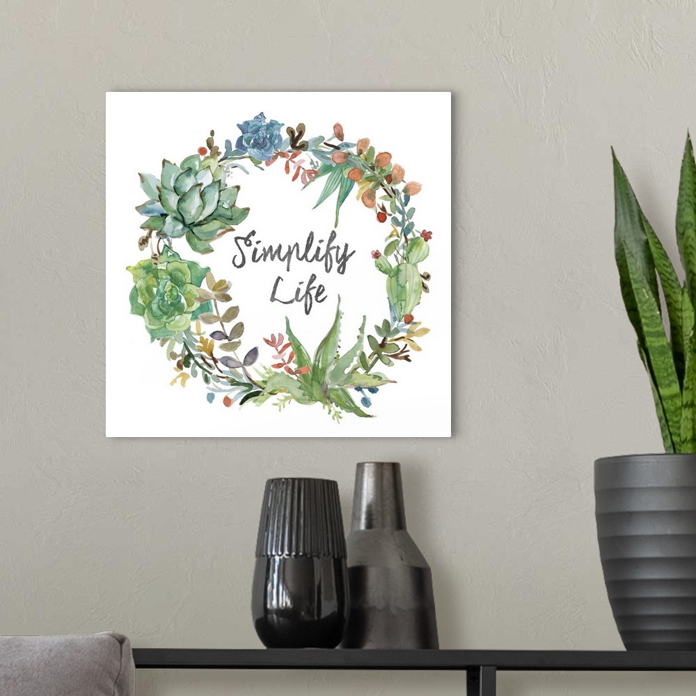 A modern room featuring Square watercolor painting of a wreath made out of succulents and colorful leaves with the phrase...