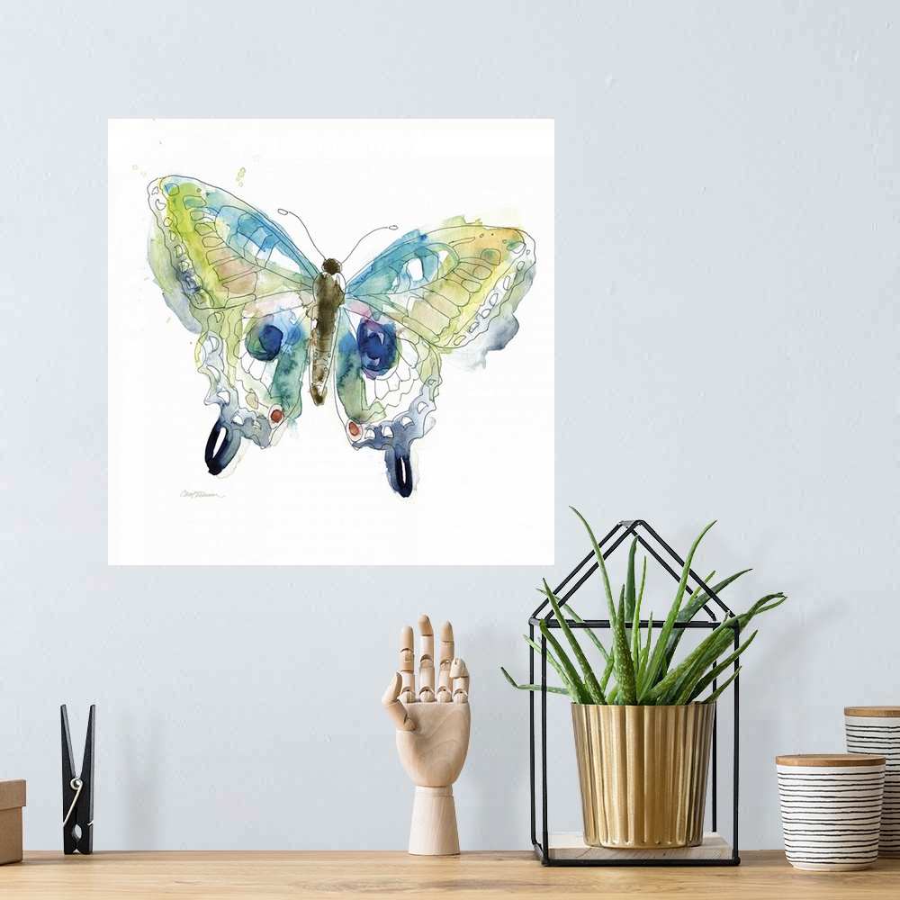 A bohemian room featuring A watercolor painting of a colorful butterfly.