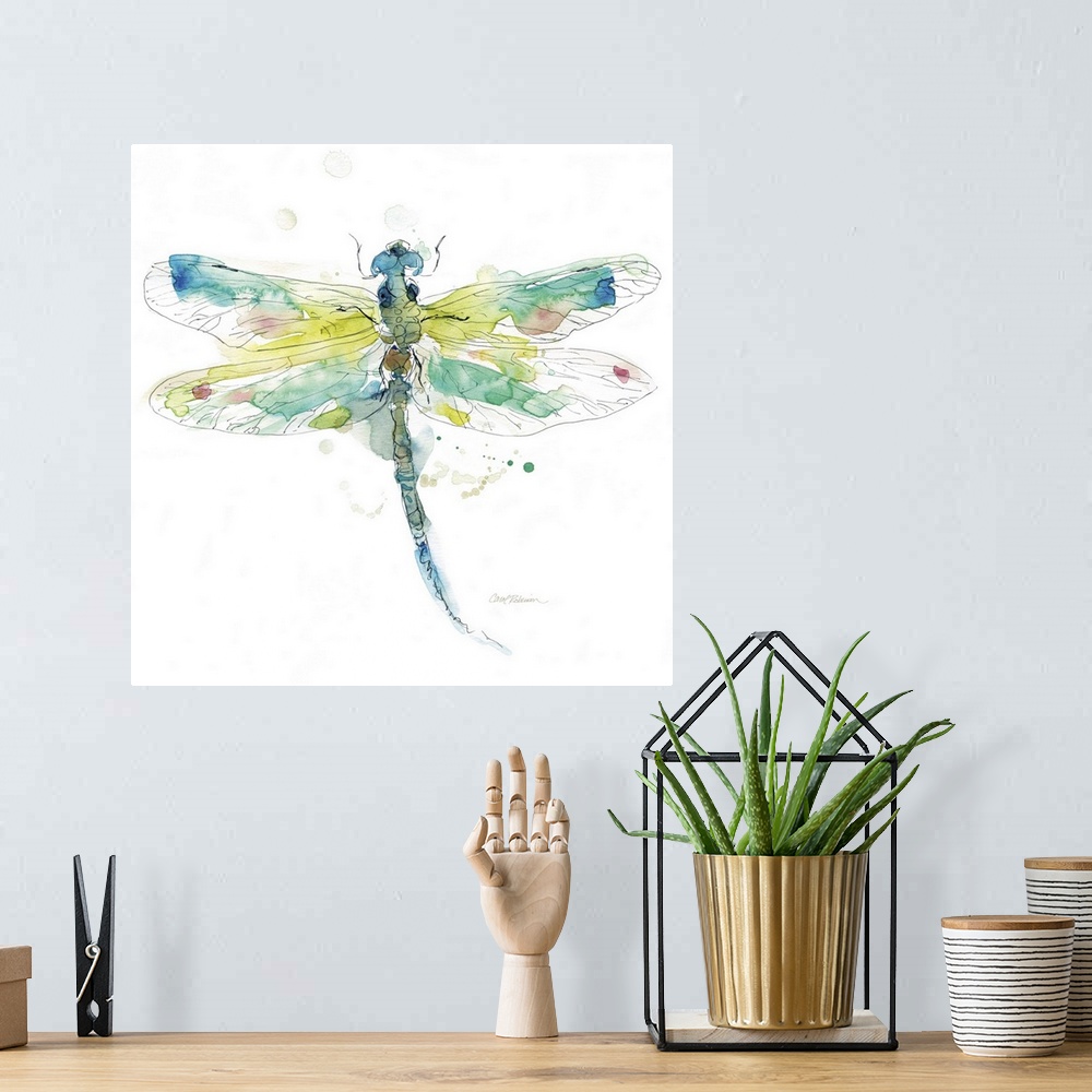 A bohemian room featuring A watercolor painting of a colorful dragonfly.