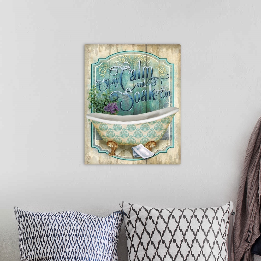 A bohemian room featuring A painted tub overlaps a distressed sign with the words, "Stay Calm and Soak On" above it.