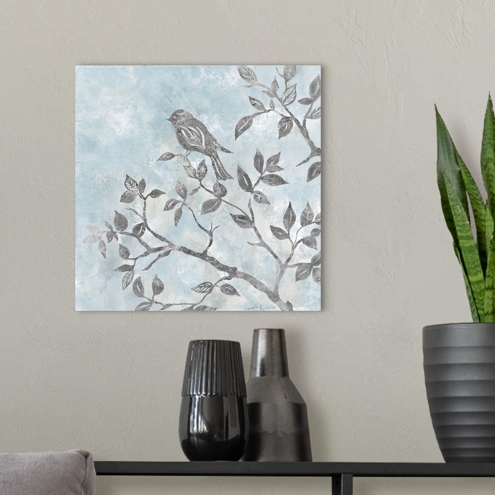 A modern room featuring Contemporary square painting of silver silhouettes of a bird and tree branches with a light blue ...