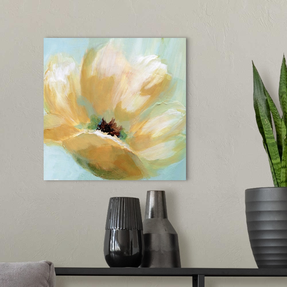 A modern room featuring Square painting of a yellow flower with cream highlights on a light blue and green background.