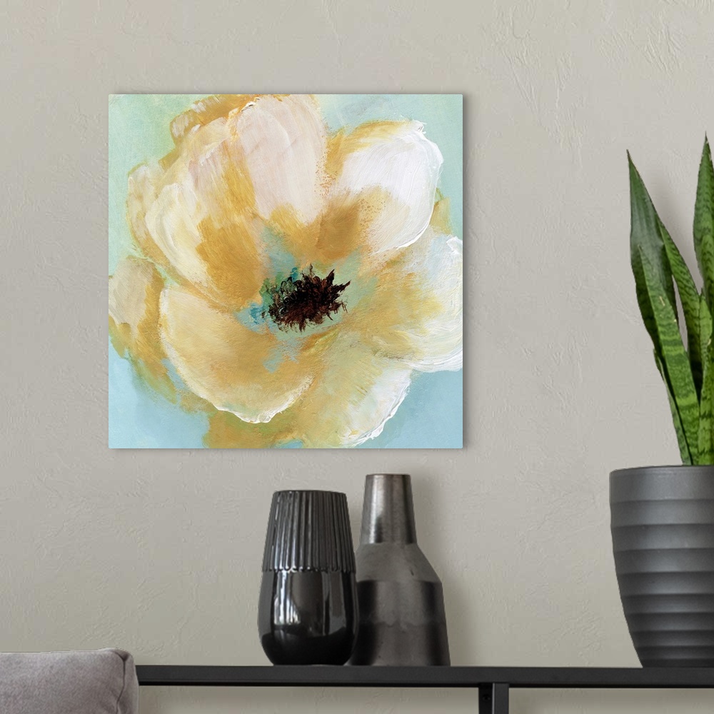 A modern room featuring Square painting of a yellow flower with cream highlights on a light blue and green background.