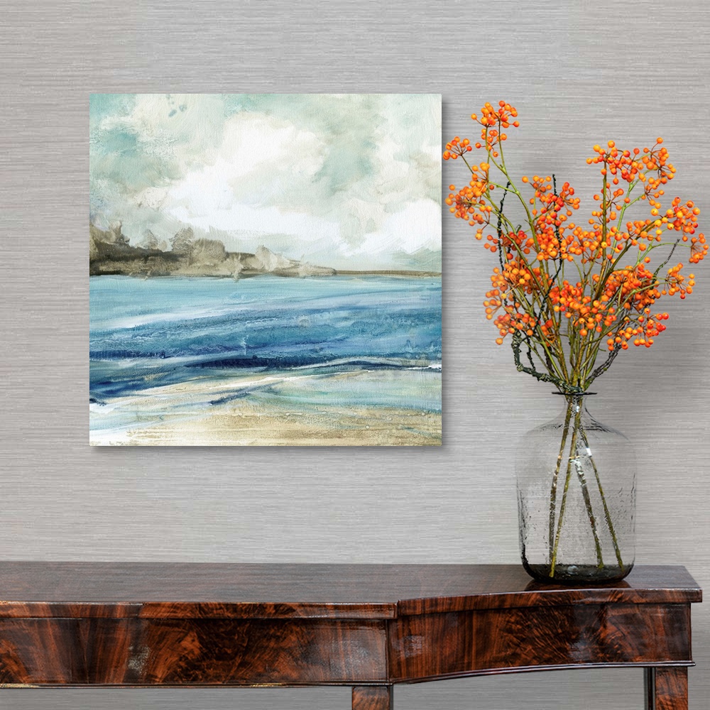 A traditional room featuring Abstract painting of the beach with layers of blue, gray, and white hues.