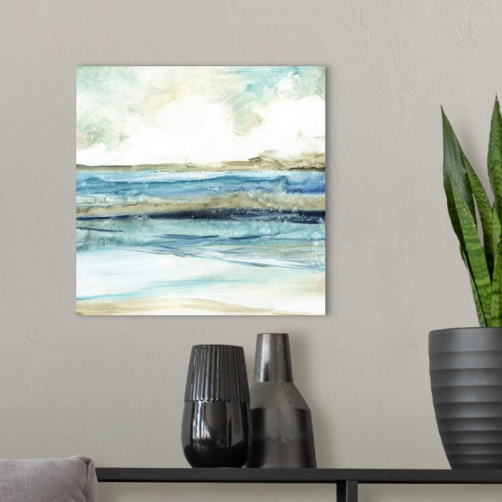 A modern room featuring Abstract painting of the beach with layers of blue, gray, and white hues.