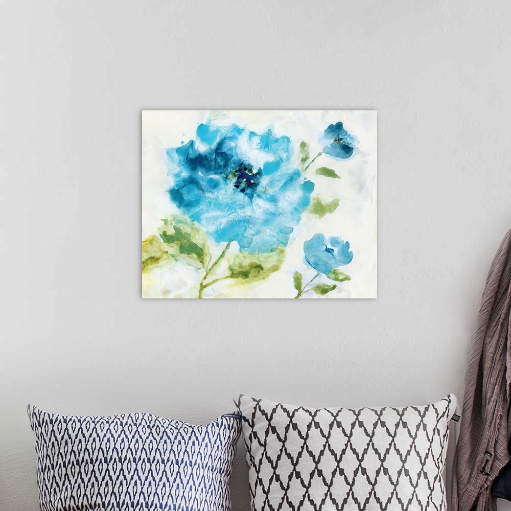 A bohemian room featuring Abstract painting of blue flowers on a white background.