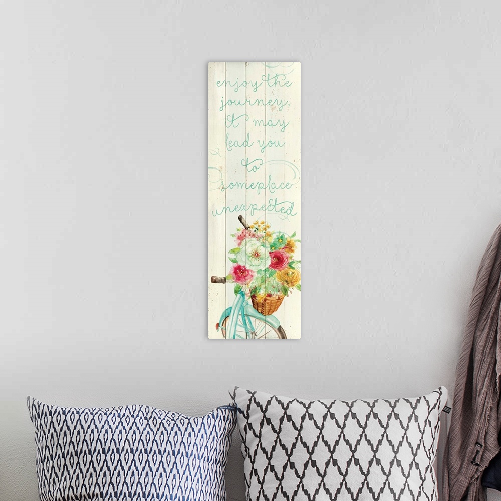 A bohemian room featuring "Enjoy the Journey, It May Lead You to Someplace Unexpected" written in blue on a faux wood backg...