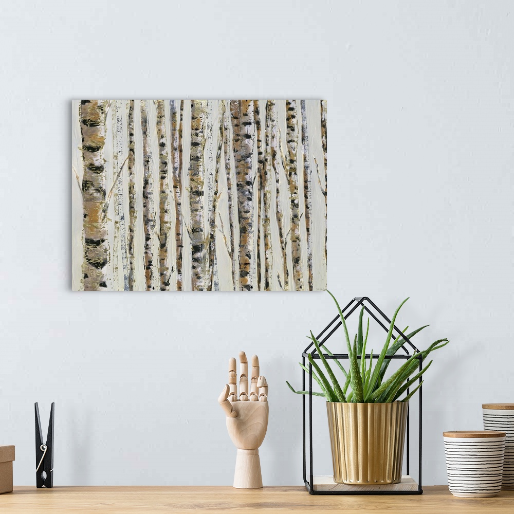 A bohemian room featuring A contemporary abstract painting of Birch trees on a cream colored background and sparkly gold te...