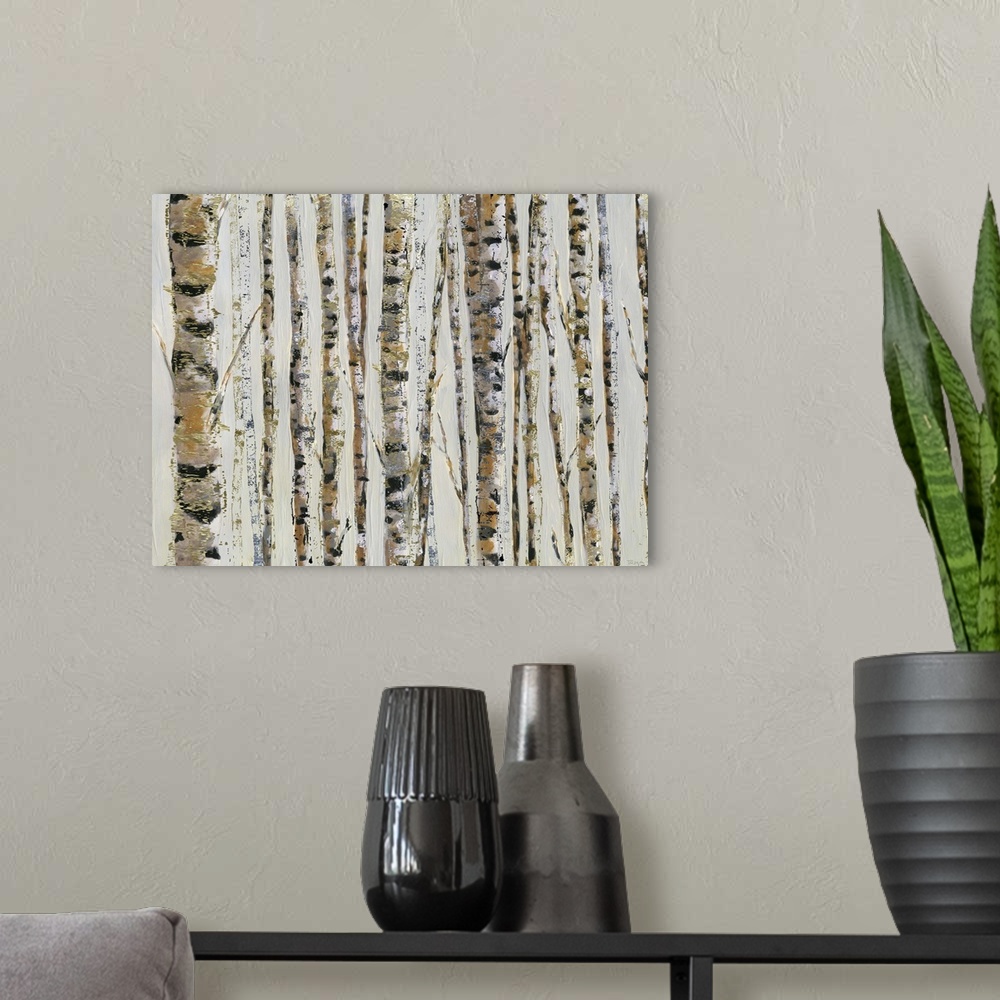 A modern room featuring A contemporary abstract painting of Birch trees on a cream colored background and sparkly gold te...