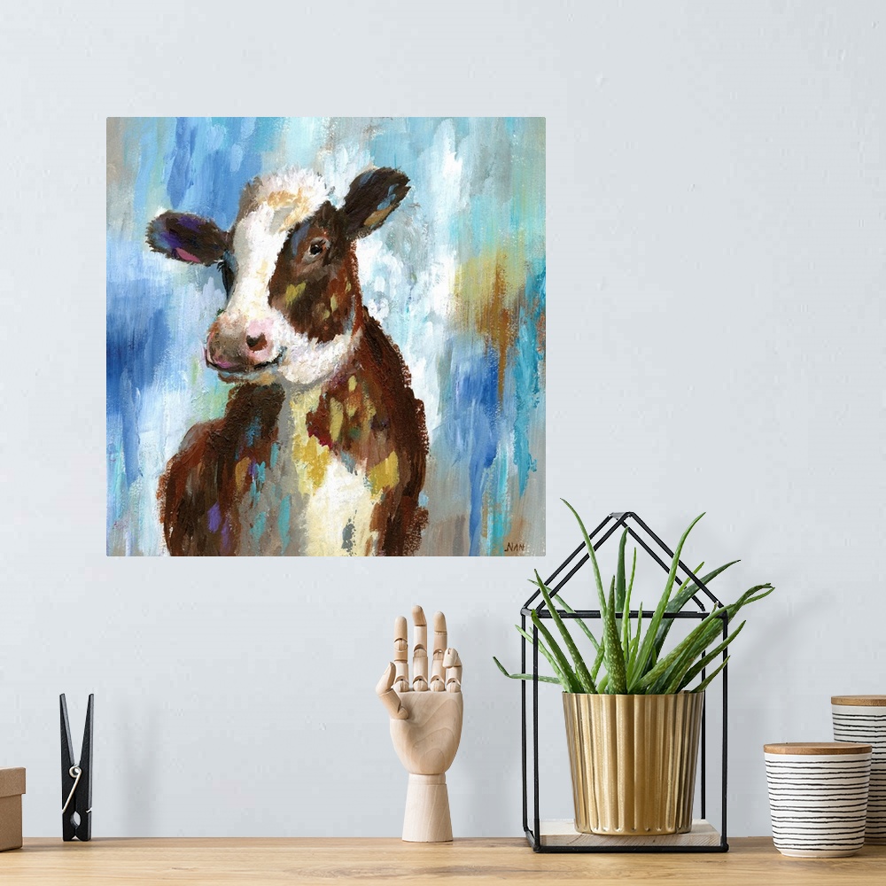 A bohemian room featuring Contemporary portrait of a young black and white cow.